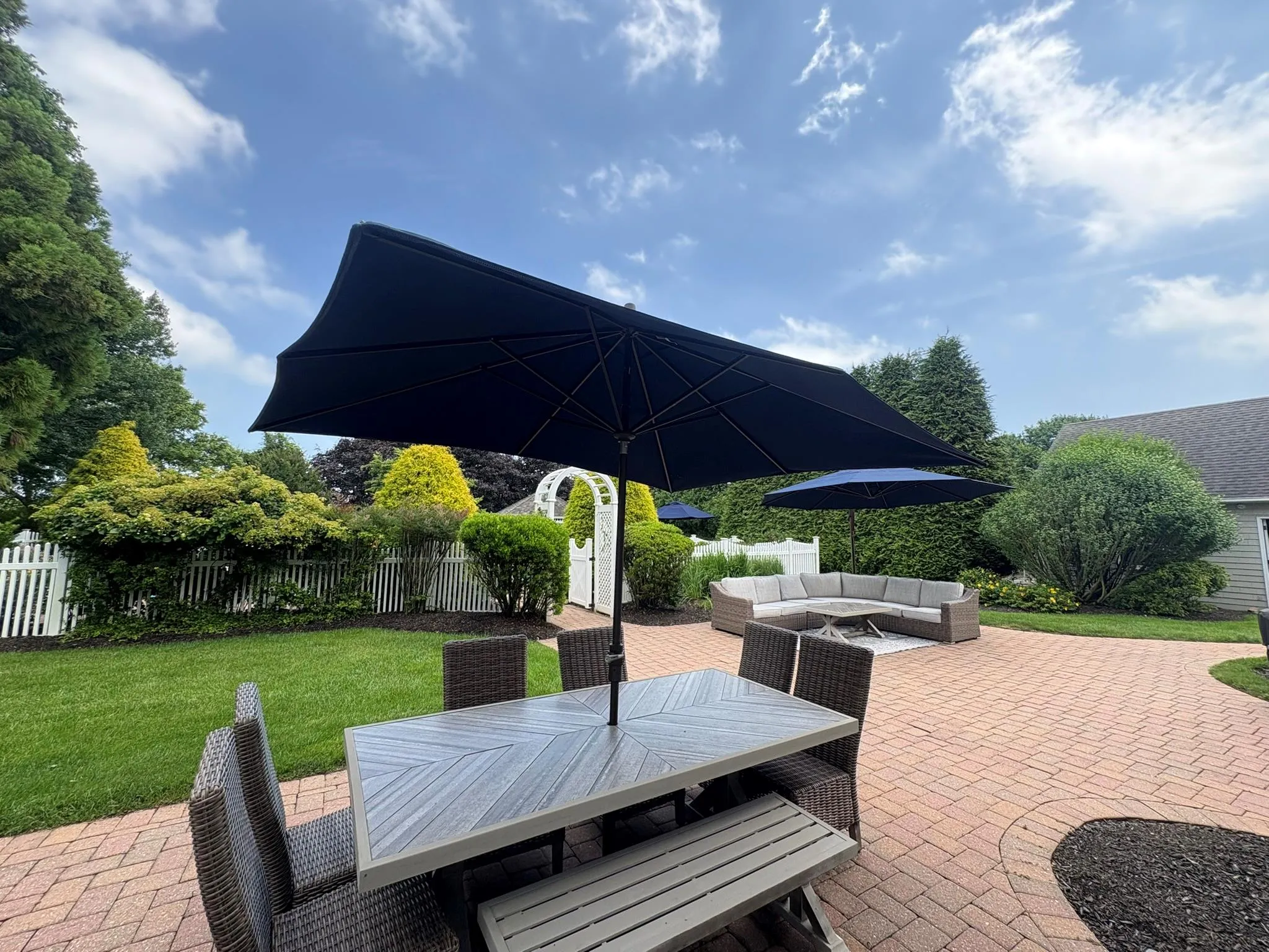 View of patio / terrace with outdoor lounge area and outdoor dining area View of patio / terrace with outdoor lounge area and outdoor dining area