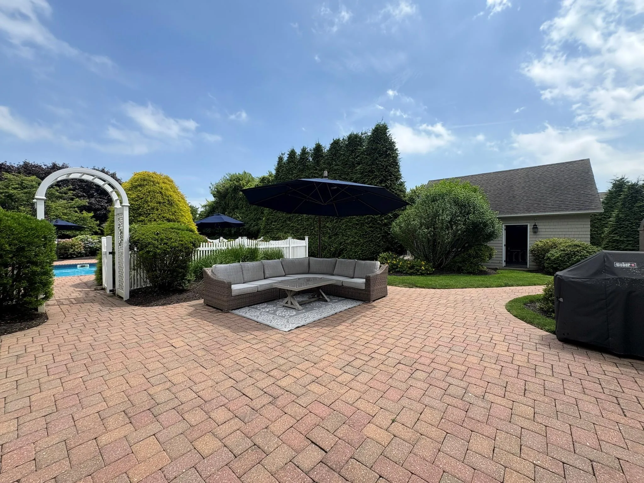 View of patio / terrace featuring outdoor lounge area and grilling area View of patio / terrace featuring outdoor lounge area and grilling area