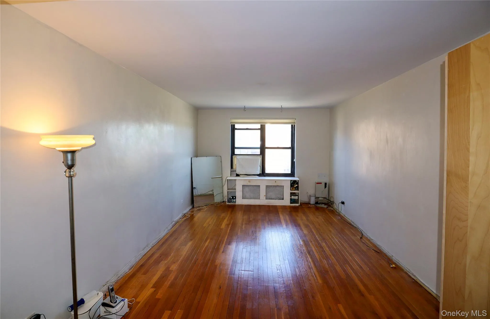 Empty room featuring hardwood / wood-style flooring Empty room featuring hardwood / wood-style flooring