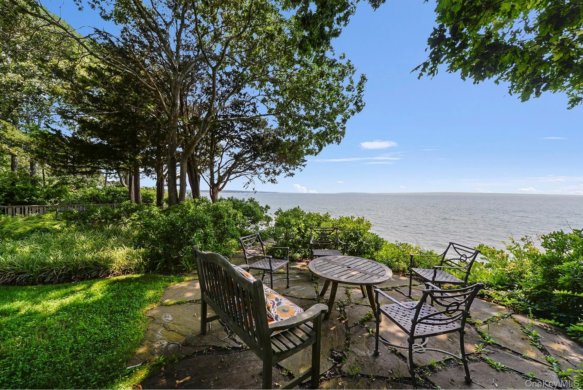 View of patio / terrace with a water view View of patio / terrace with a water view