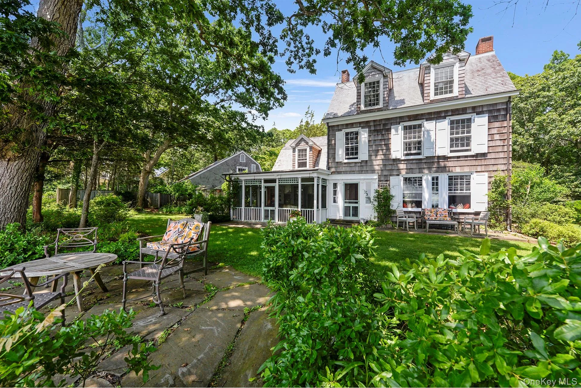 Rear of home with screen porch Rear of home with screen porch