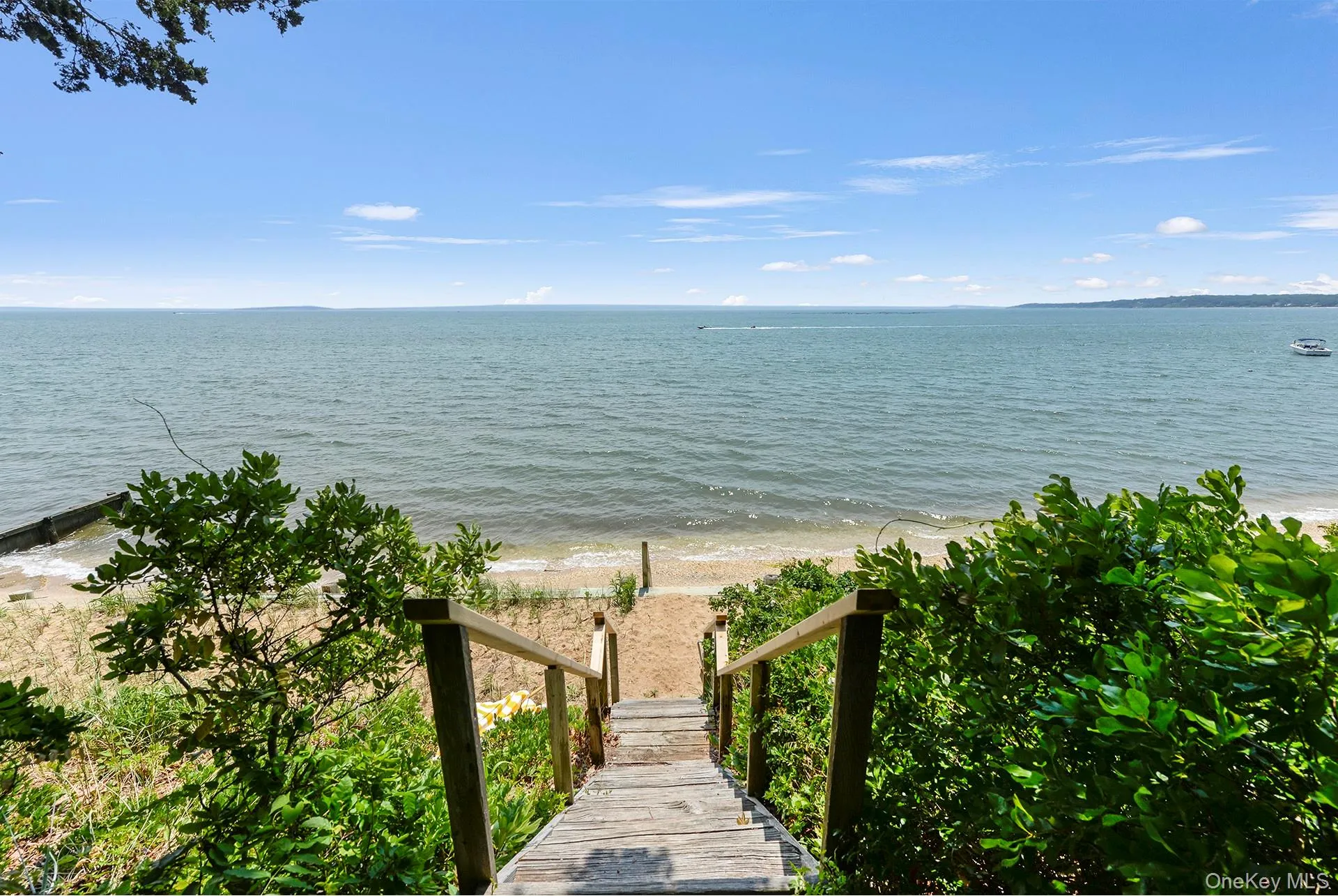 Water view featuring the beach Water view featuring the beach