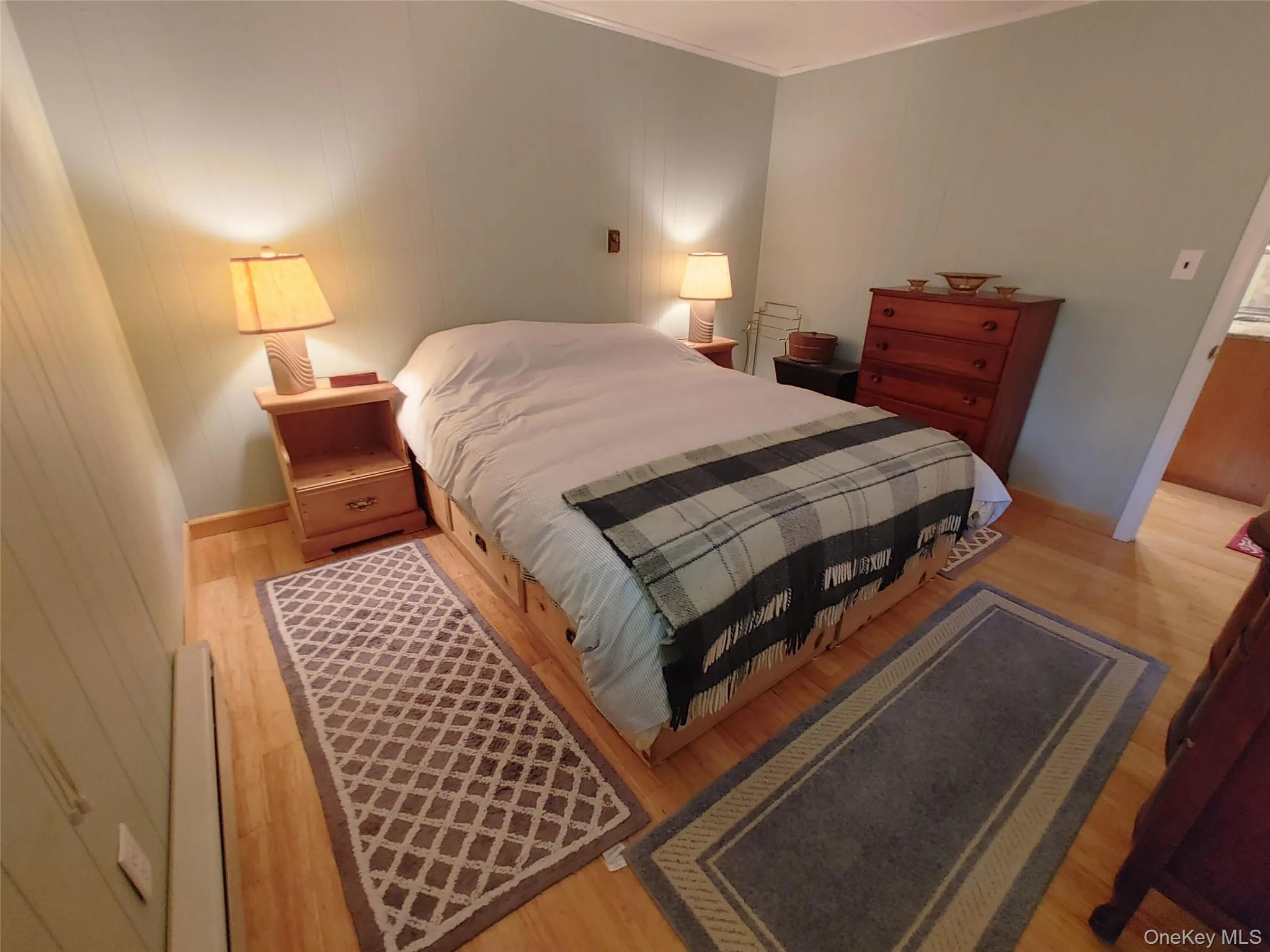 Bedroom with bamboo wood plank floors Bedroom with bamboo wood plank floors