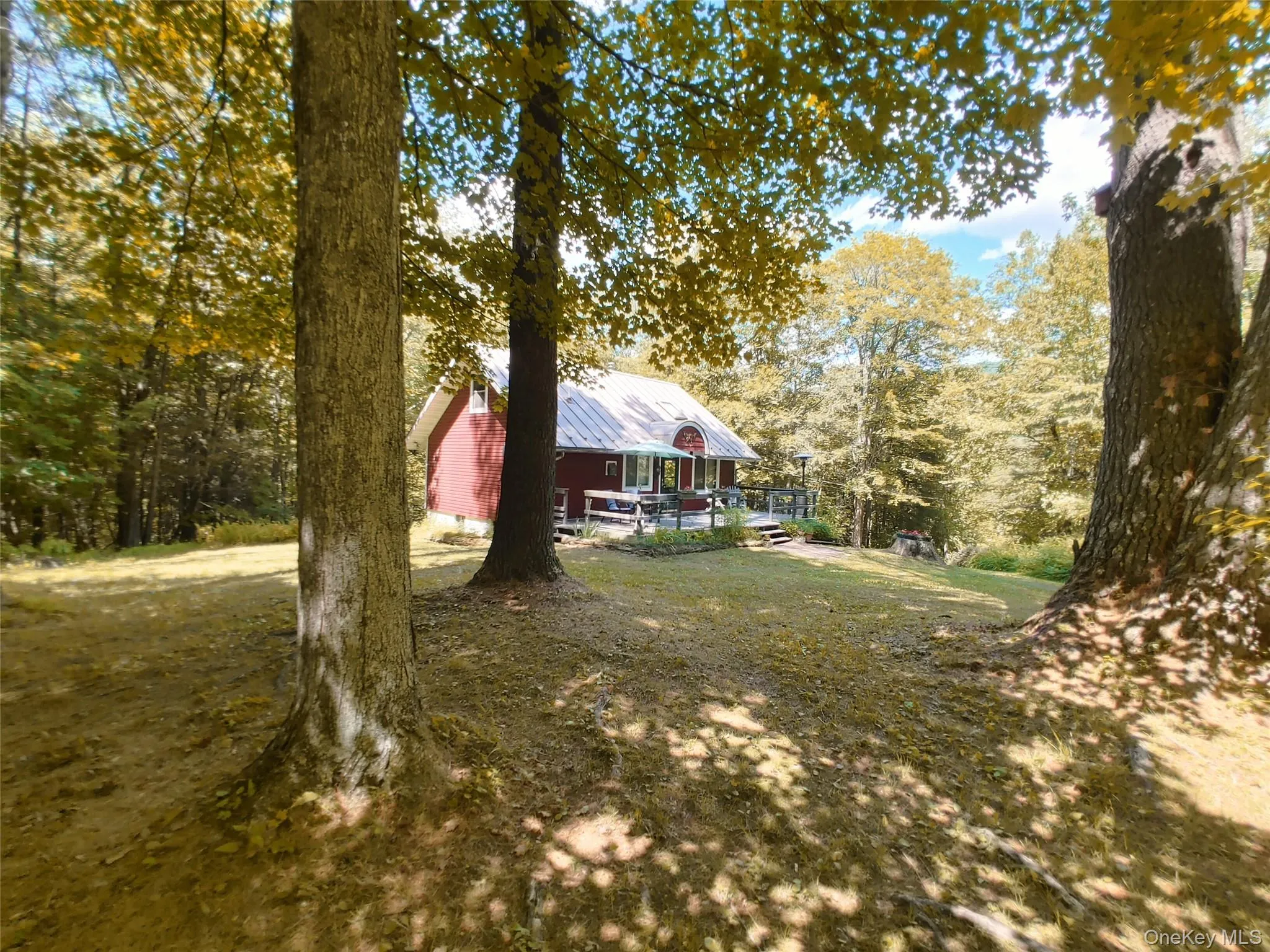 View of yard from the fire pit area. View of yard from the fire pit area.