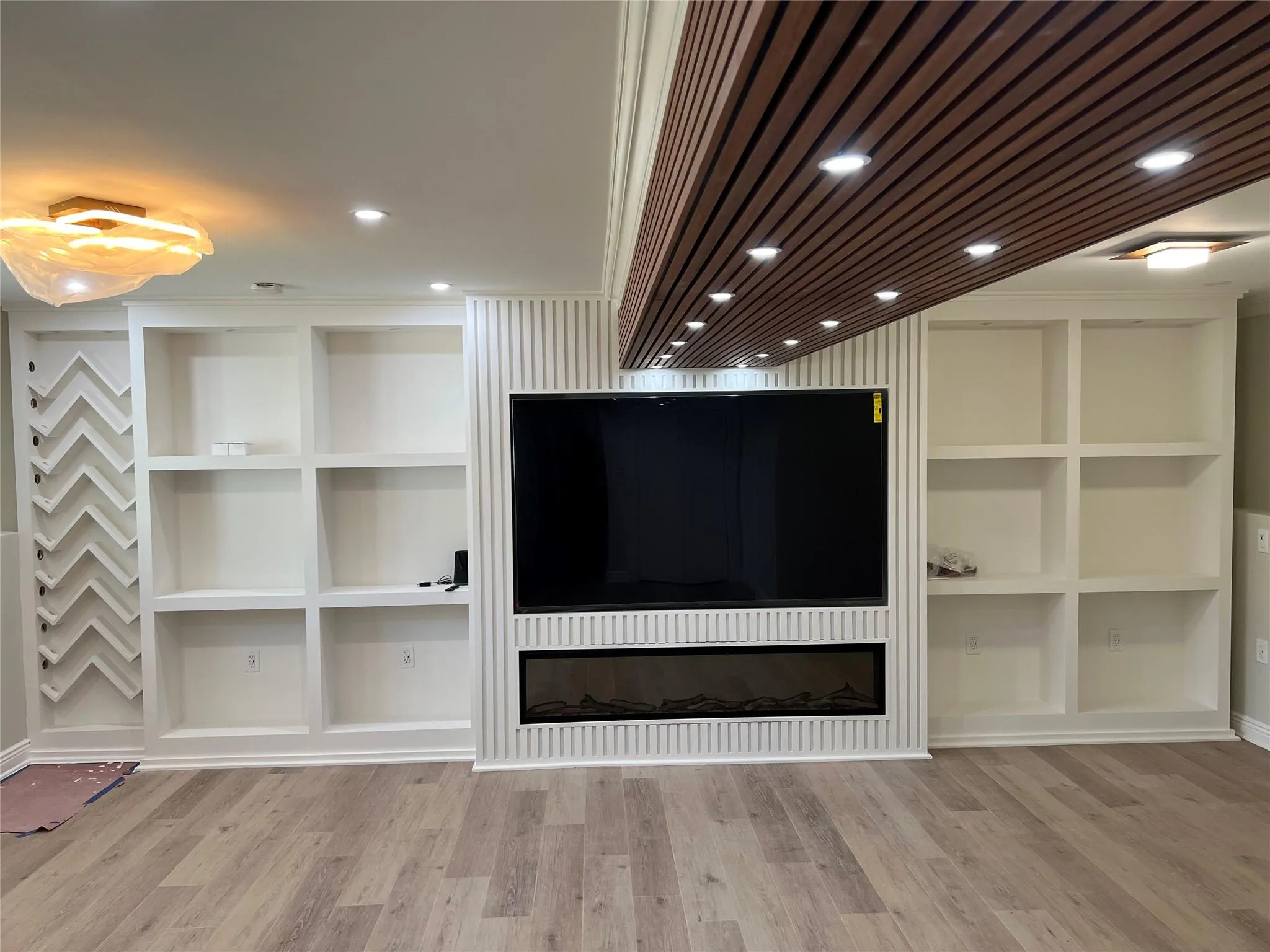 Detailed view of wood finished floors and built in shelves Detailed view of wood finished floors and built in shelves