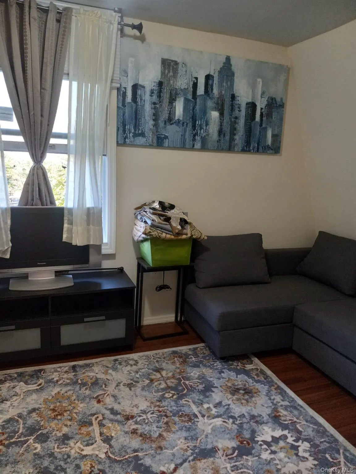 Living area with wood finished floors Living area with wood finished floors