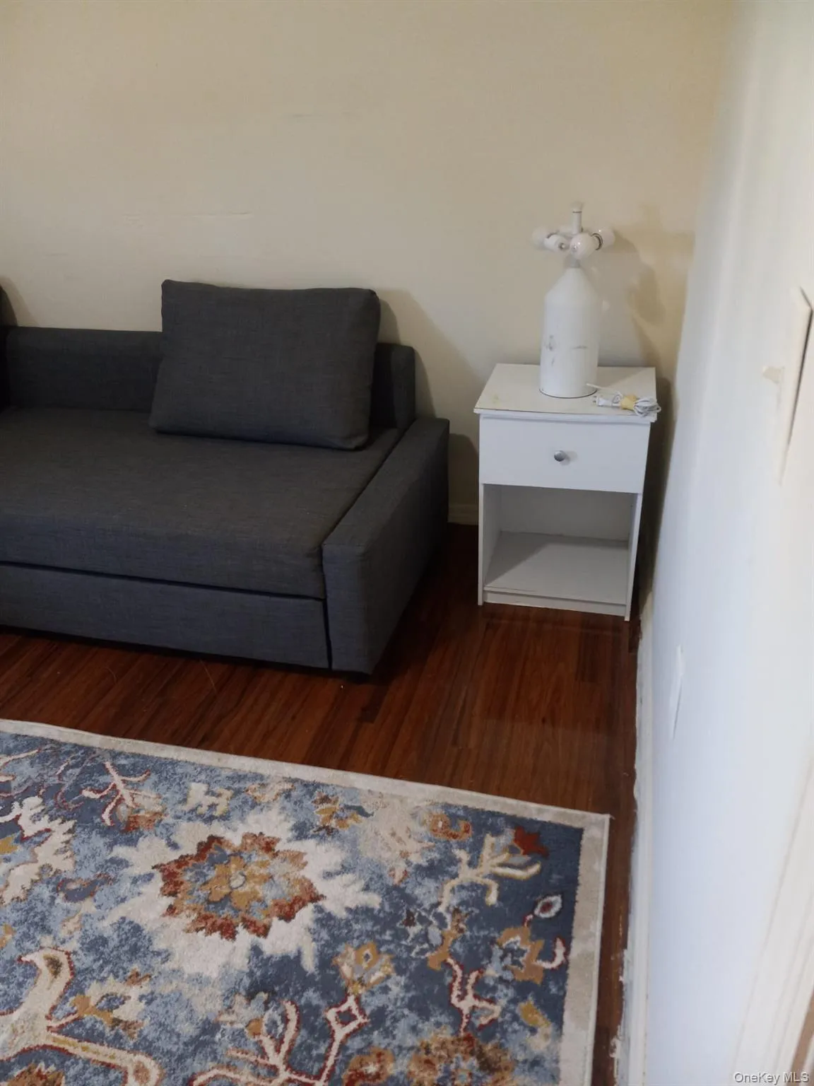 Living area with wood finished floors Living area with wood finished floors