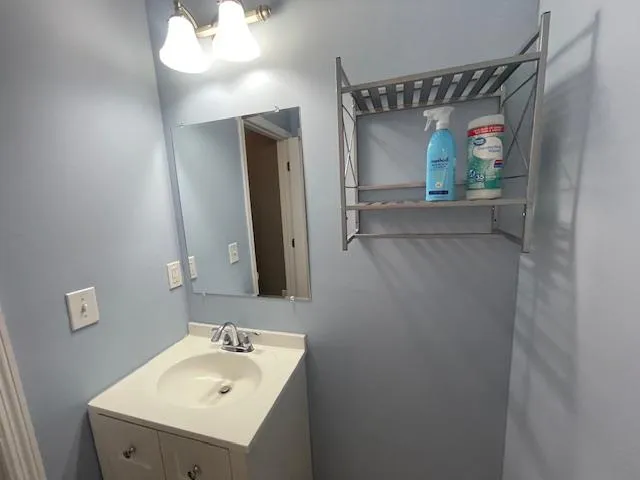 Bathroom featuring vanity Bathroom featuring vanity
