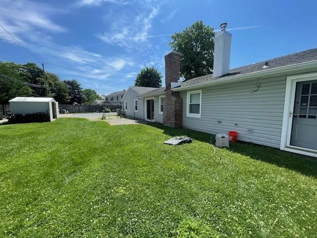 View of yard featuring a storage shed View of yard featuring a storage shed