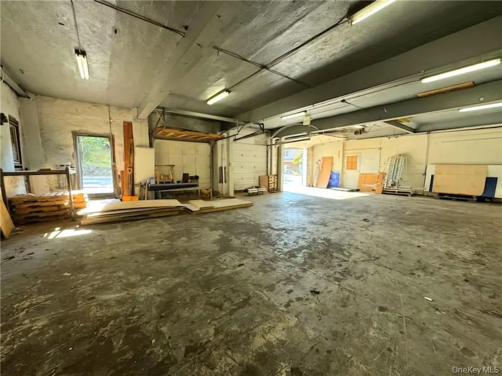 Miscellaneous room featuring concrete flooring Miscellaneous room featuring concrete flooring