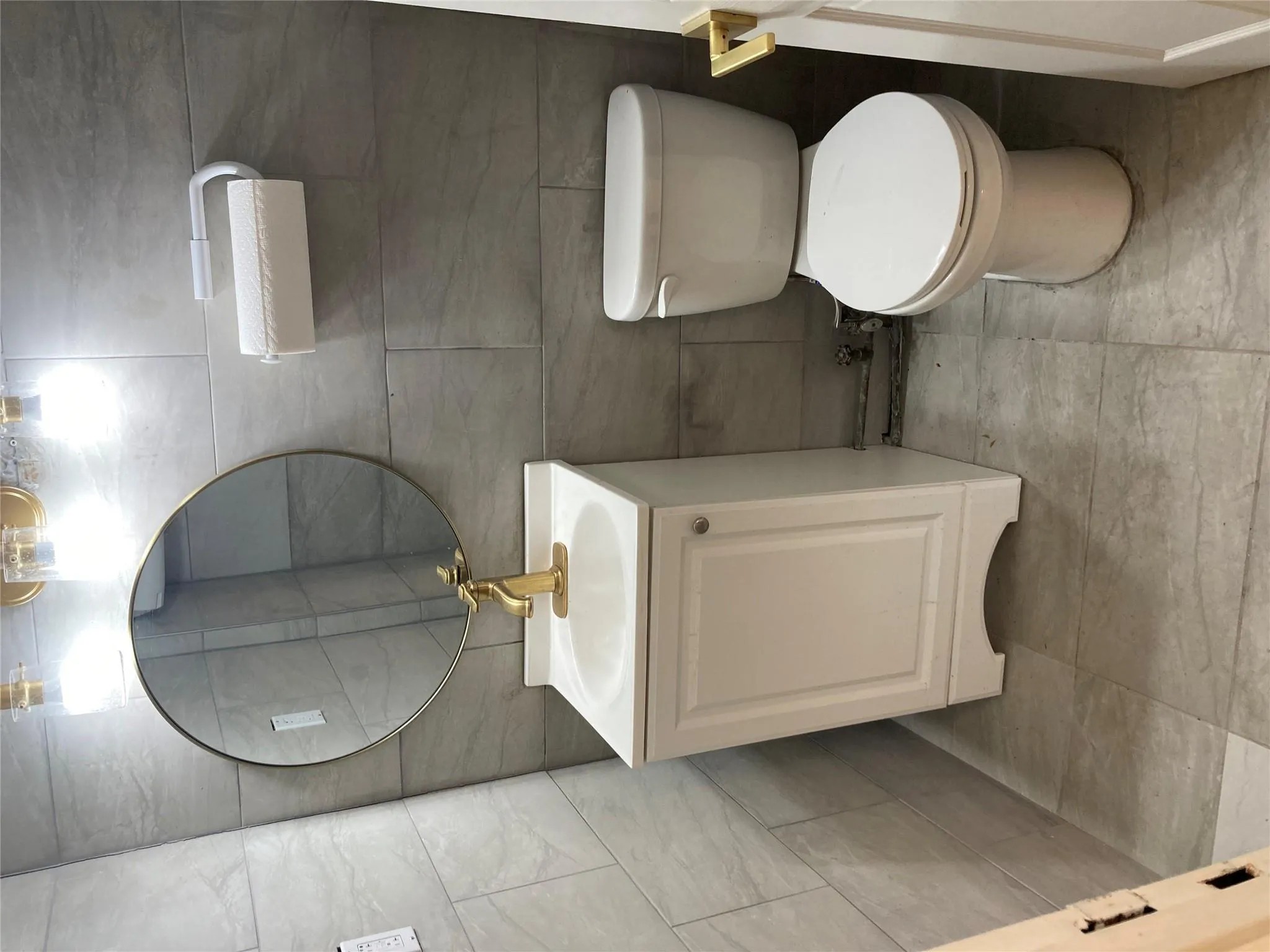 Bathroom with tile walls and vanity Bathroom with tile walls and vanity