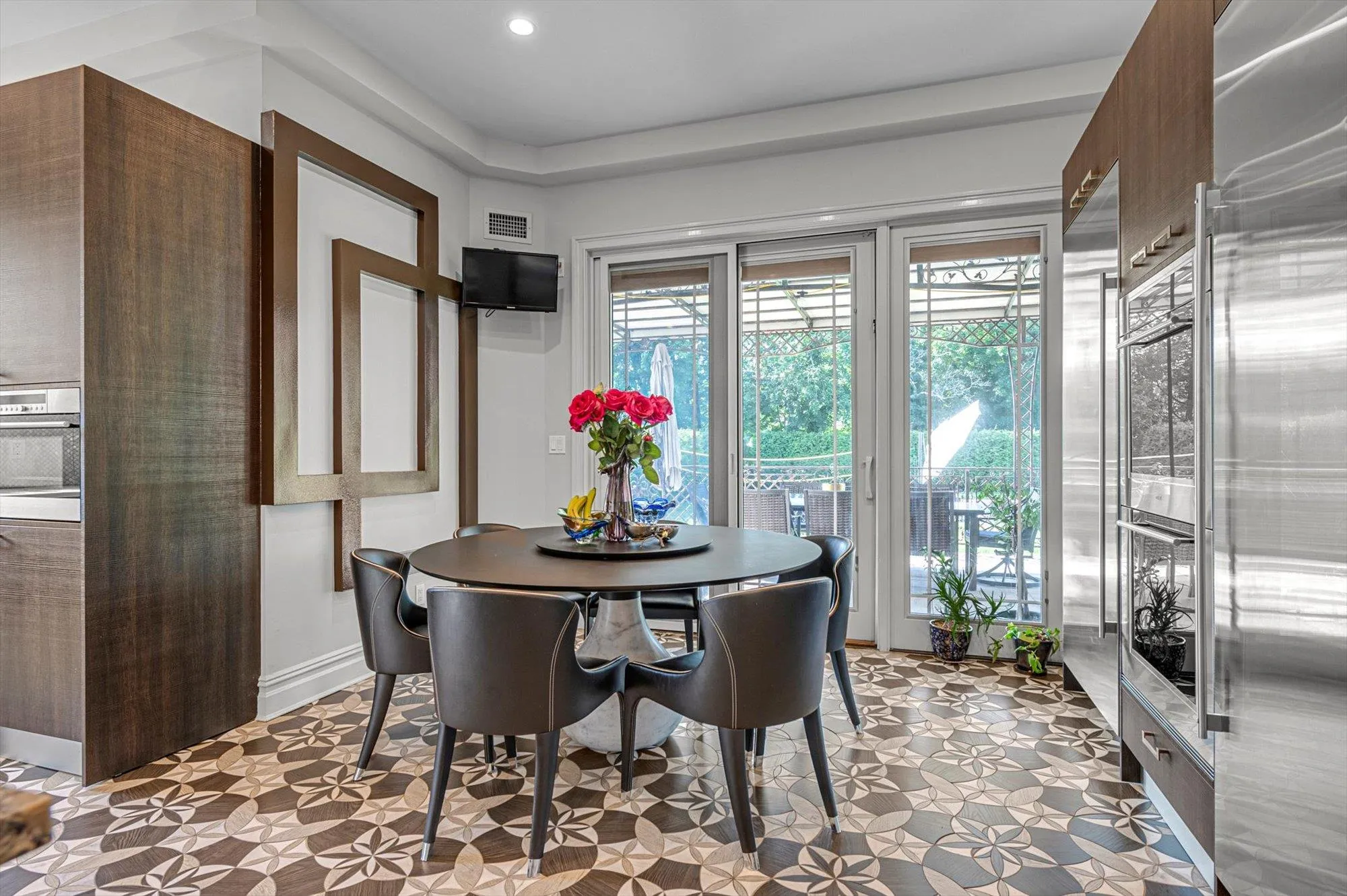 Breakfast Area featuring recessed lighting Overlooking Backyard Breakfast Area featuring recessed lighting Overlooking Backyard