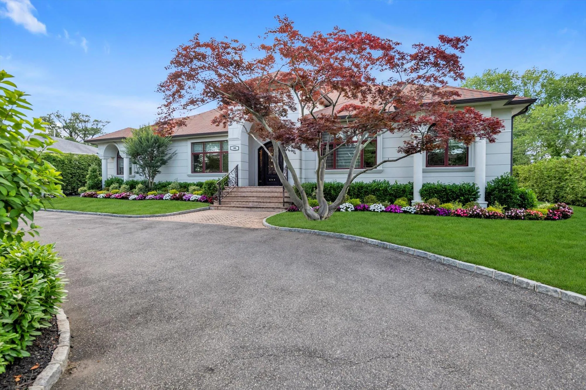 view of Circular Driveway with a front yard view of Circular Driveway with a front yard