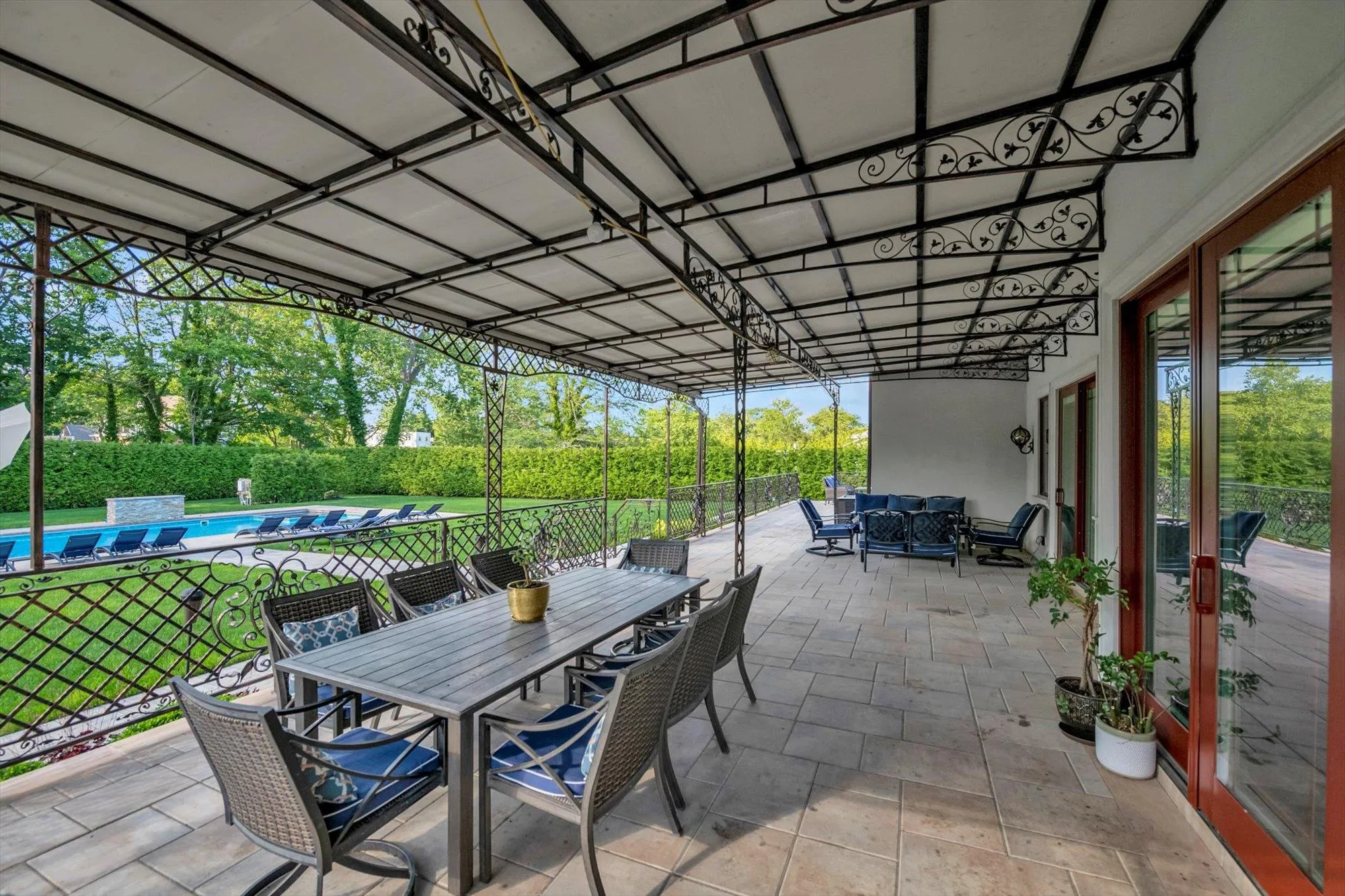 Covered Porch. Fenced backyard featuring outdoor dining area, outdoor lounge area, and a patio Covered Porch. Fenced backyard featuring outdoor dining area, outdoor lounge area, and a patio