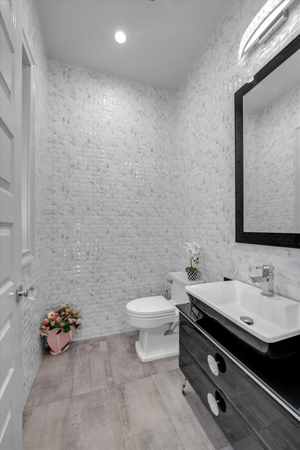 Powder room with vanity and toilet Powder room with vanity and toilet
