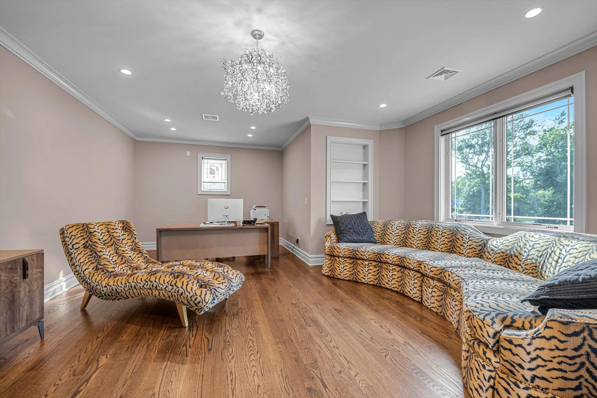 Office space in Primary Suite featuring recessed lighting, wood finished floors, Barn Door Closing, plenty of natural light, a chandelier, and ornamental molding Office space in Primary Suite featuring recessed lighting, wood finished floors, Barn Door Closing, plenty of natural light, a chandelier, and ornamental molding