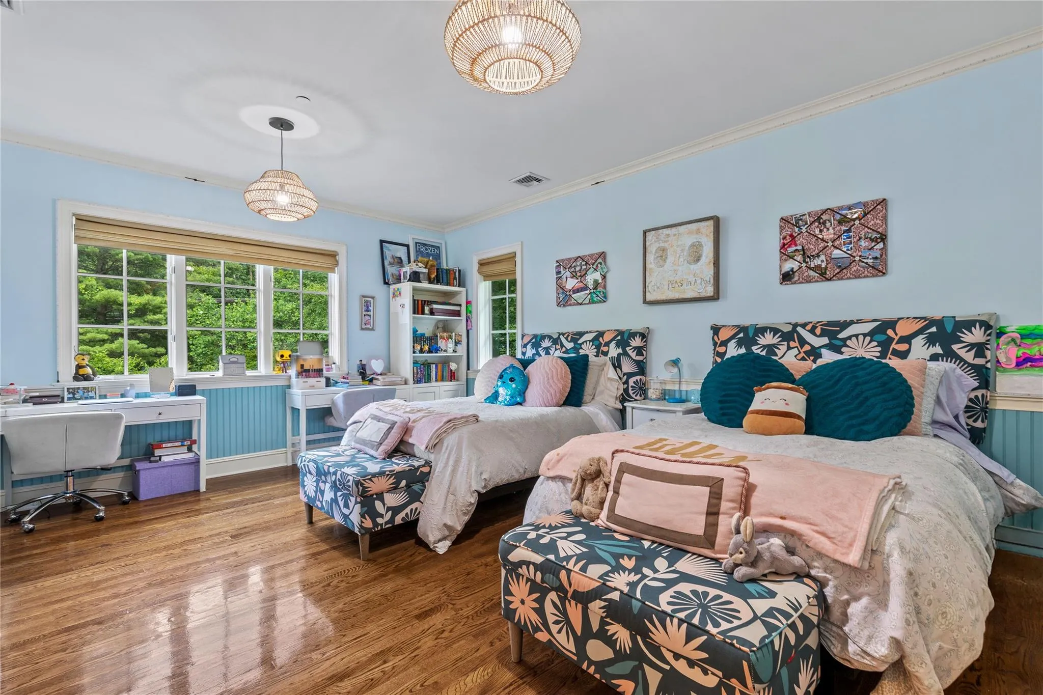 Large Bedroom featuring crown molding, wood finished floors, and an office area Large Bedroom featuring crown molding, wood finished floors, and an office area