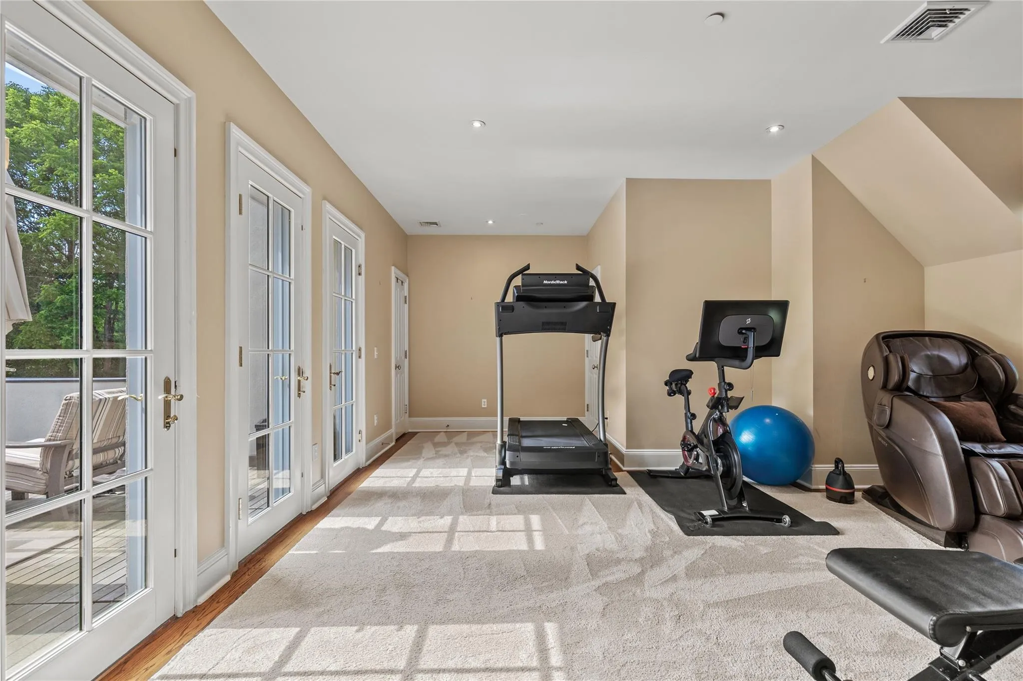 Exercise area featuring french doors to the outside Exercise area featuring french doors to the outside