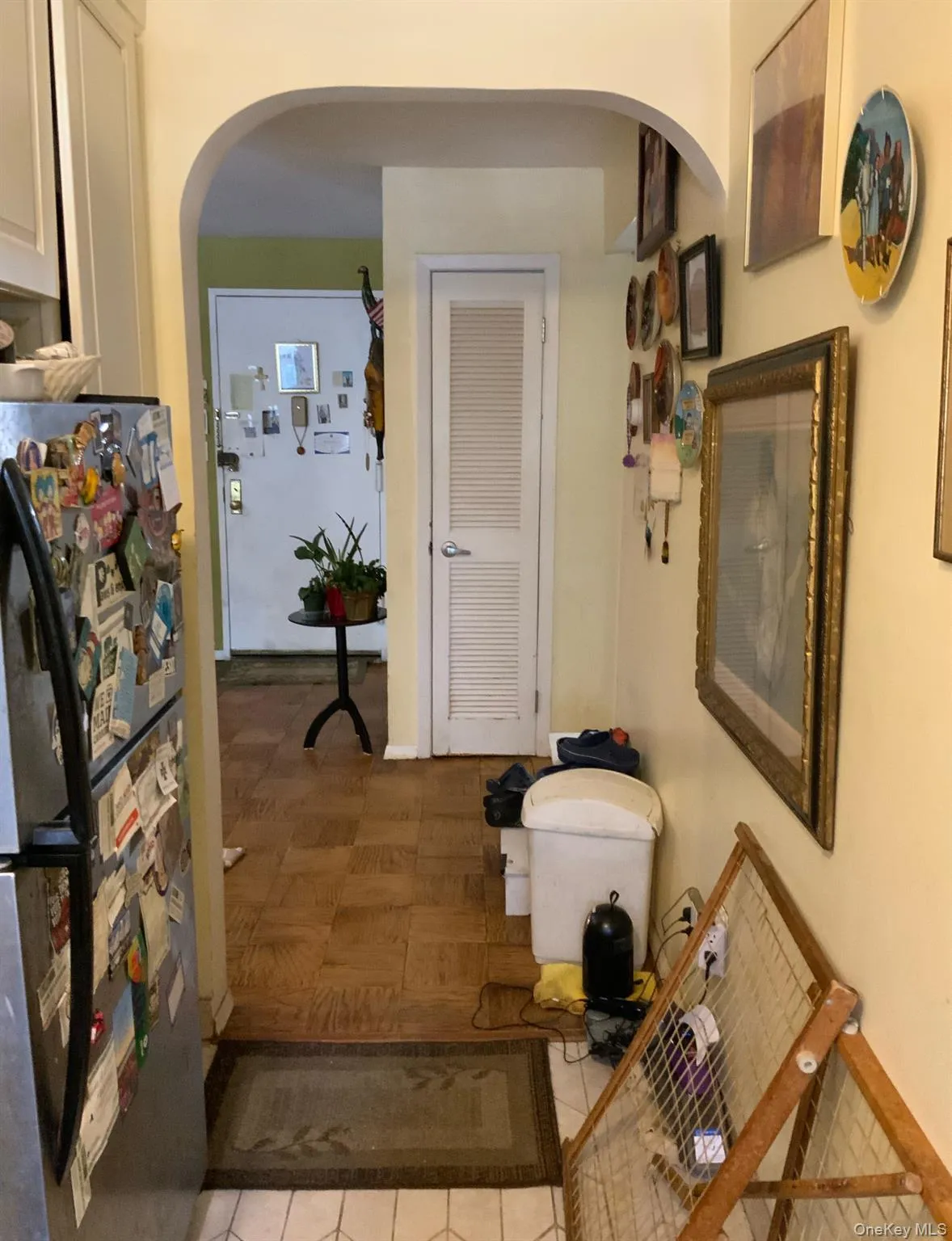 Hallway featuring arched walkways Hallway featuring arched walkways