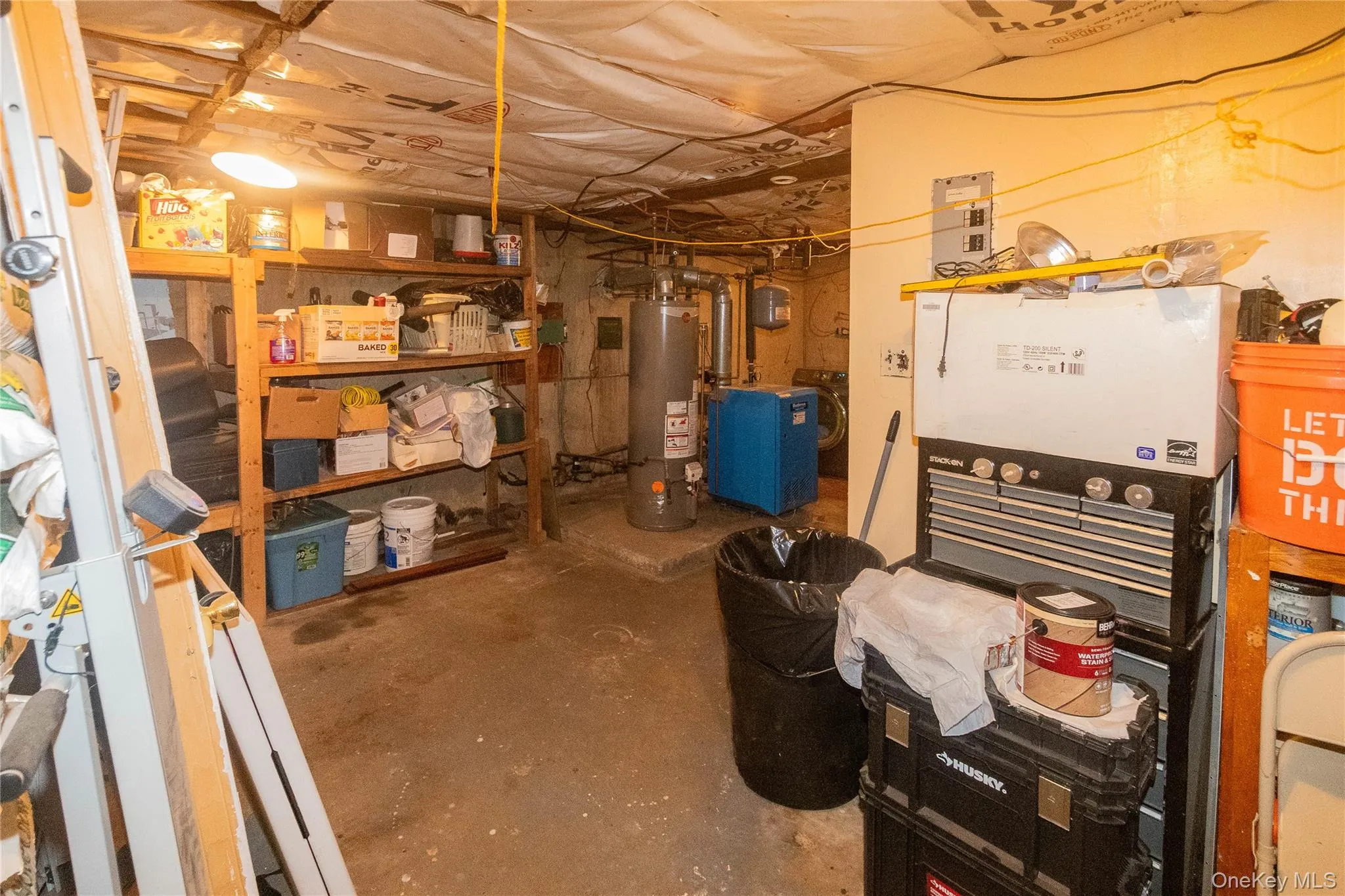Basement area with utilities and laundry area. Plenty of storage space. Basement area with utilities and laundry area. Plenty of storage space.