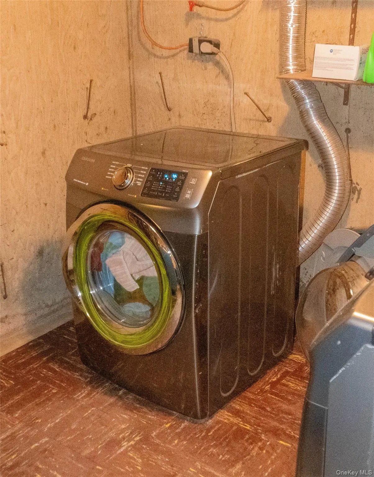 Laundry area with dryer hookup Laundry area with dryer hookup
