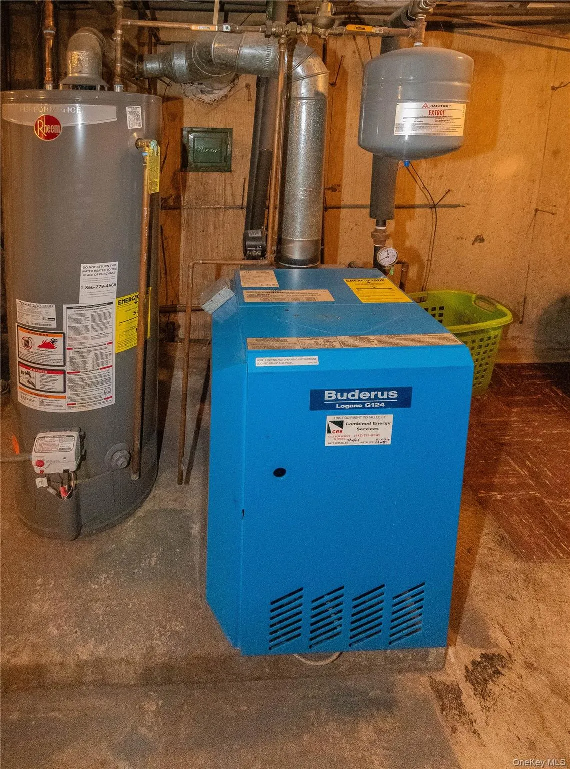 Utilities featuring water heater and furnace Utilities featuring water heater and furnace