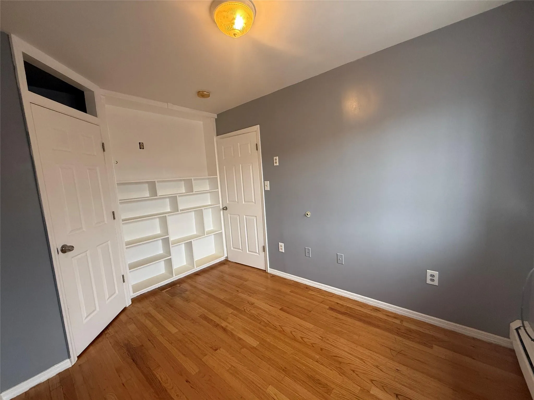 Empty room with wood finished floors Empty room with wood finished floors