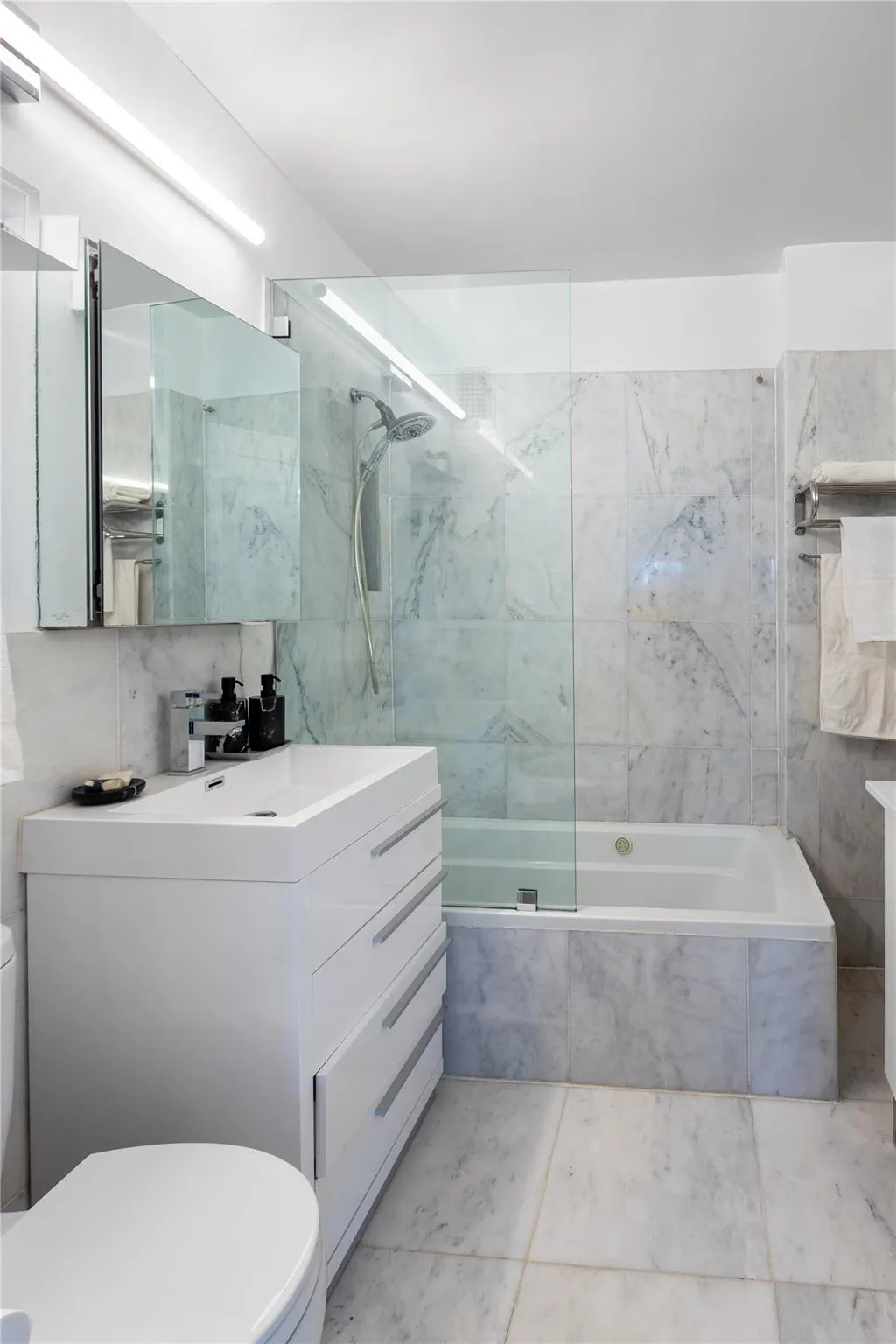 Bathroom with vanity and tile walls Bathroom with vanity and tile walls