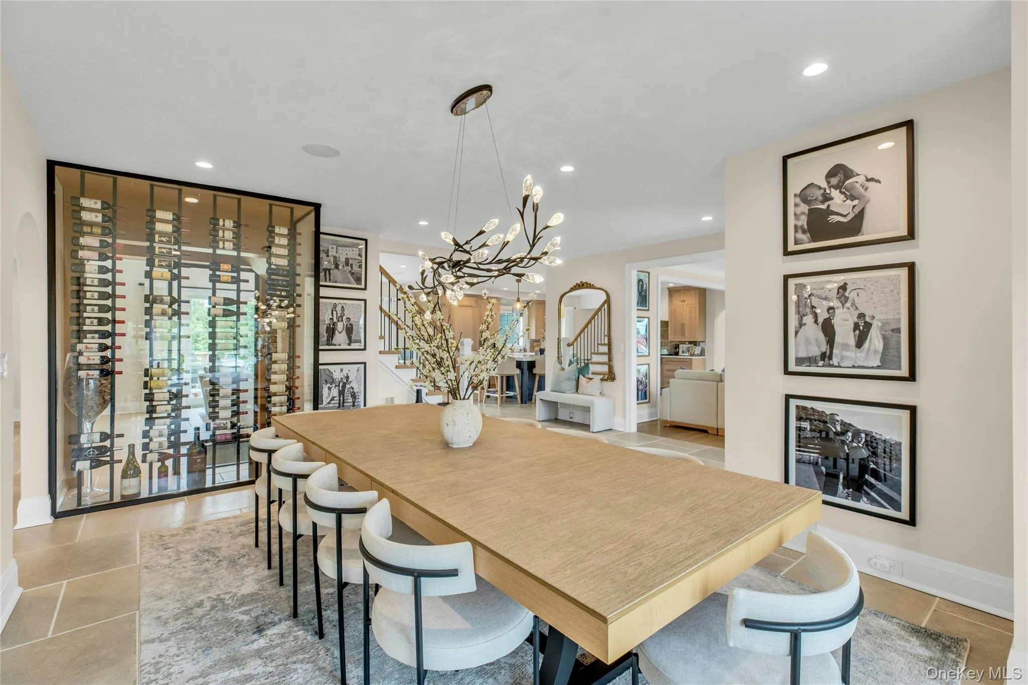 Dining room with stairs, a chandelier, and recessed lighting Dining room with stairs, a chandelier, and recessed lighting