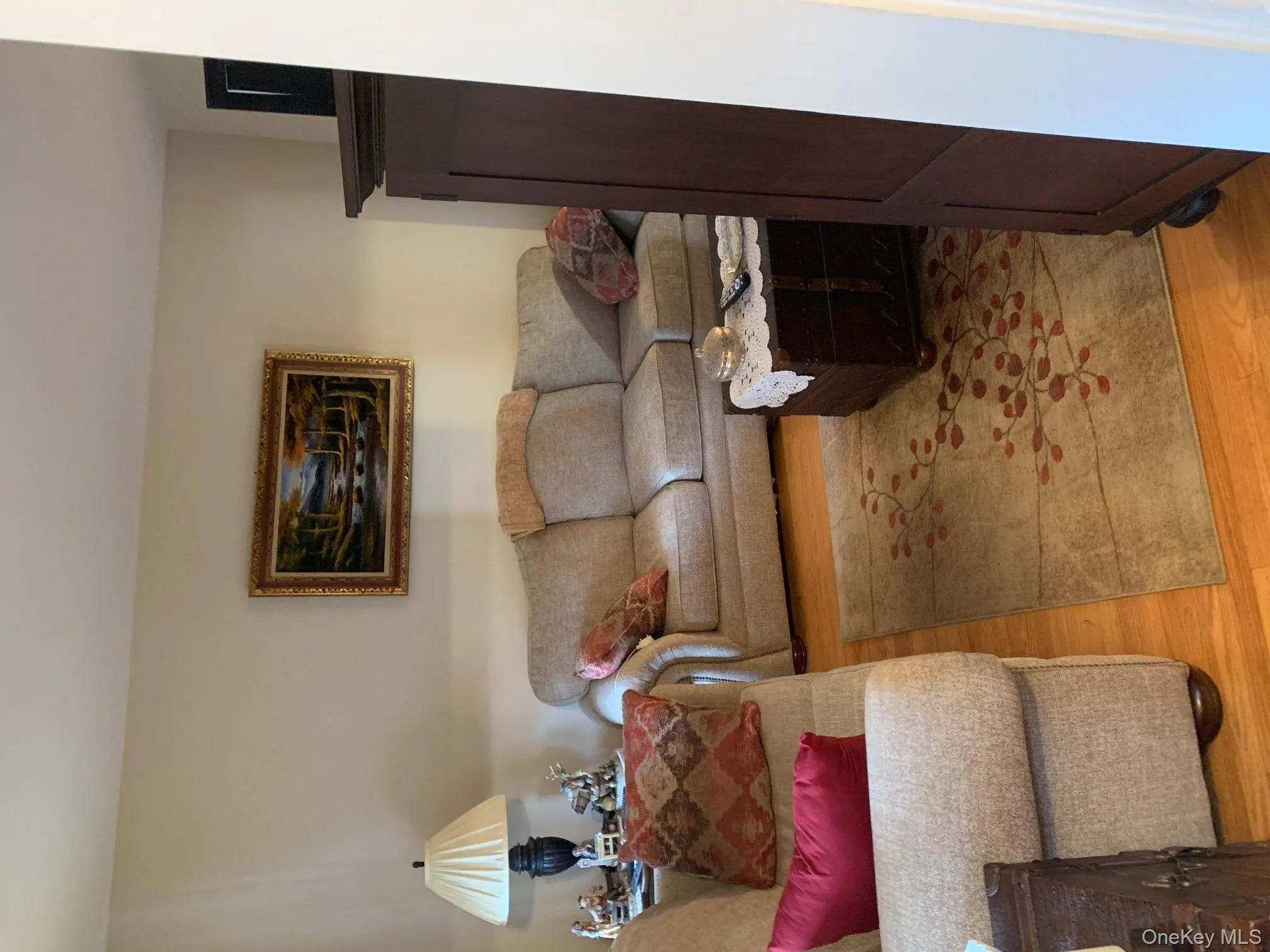 Living room with hardwood / wood-style flooring Living room with hardwood / wood-style flooring