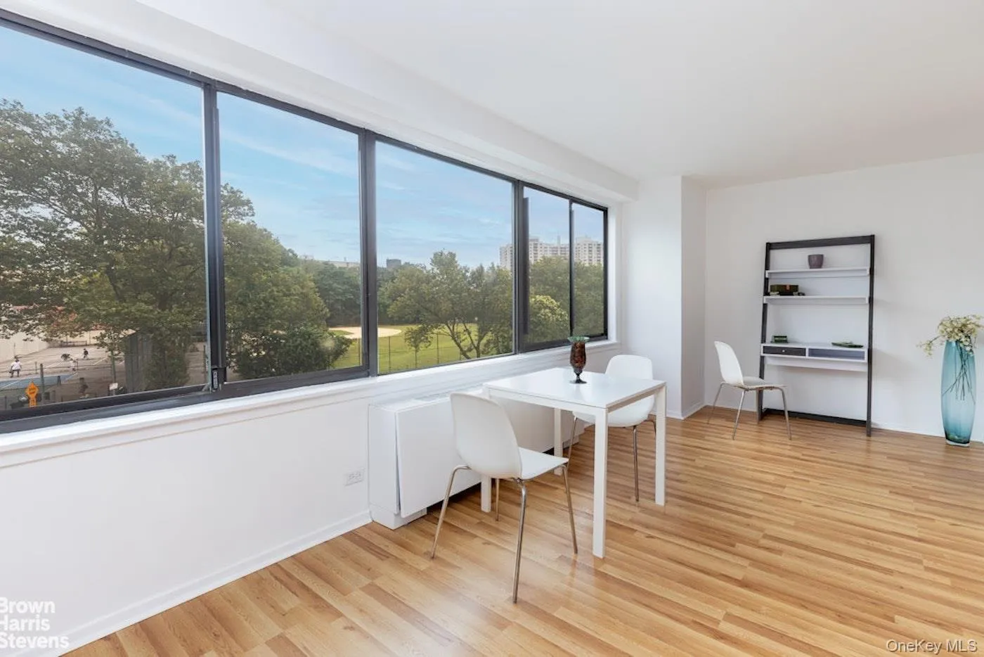 Home office featuring light wood-style flooring and baseboards Home office featuring light wood-style flooring and baseboards