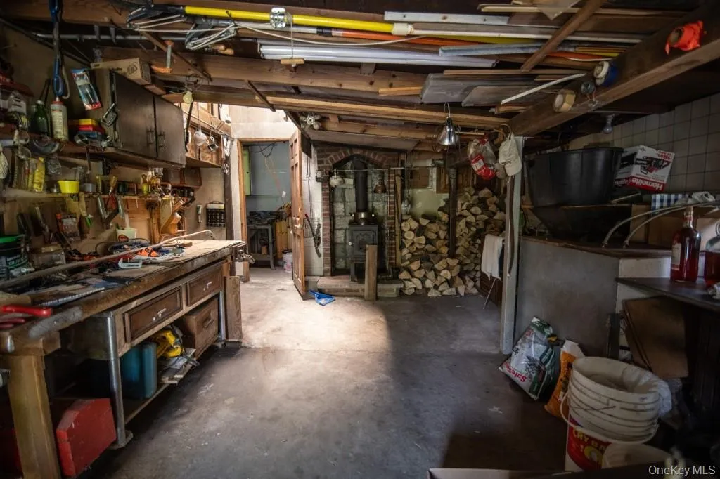 Basement featuring a workshop area Basement featuring a workshop area