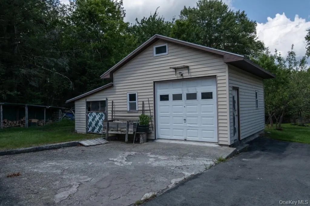 Garage with driveway Garage with driveway