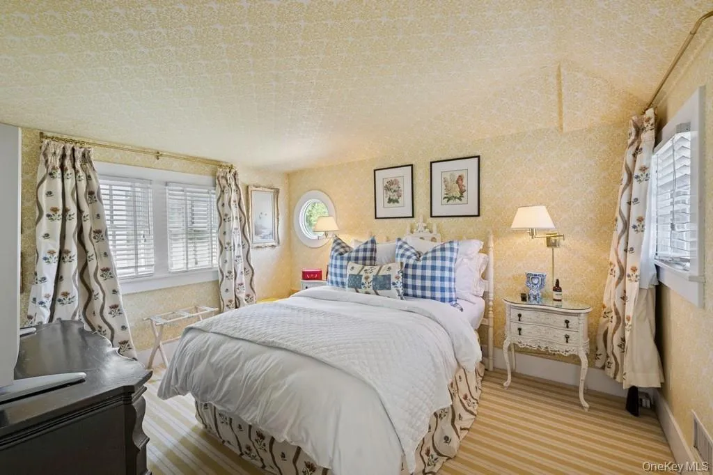 Bedroom with baseboards and carpet floors Bedroom with baseboards and carpet floors