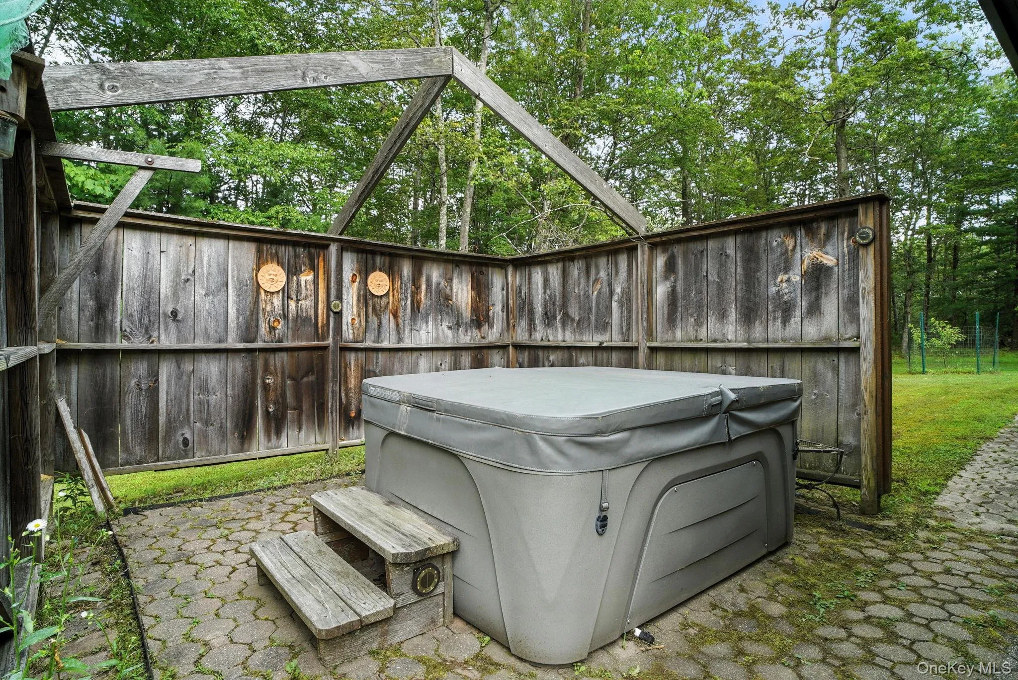 Hot Tub privately set behing fencing Hot Tub privately set behing fencing