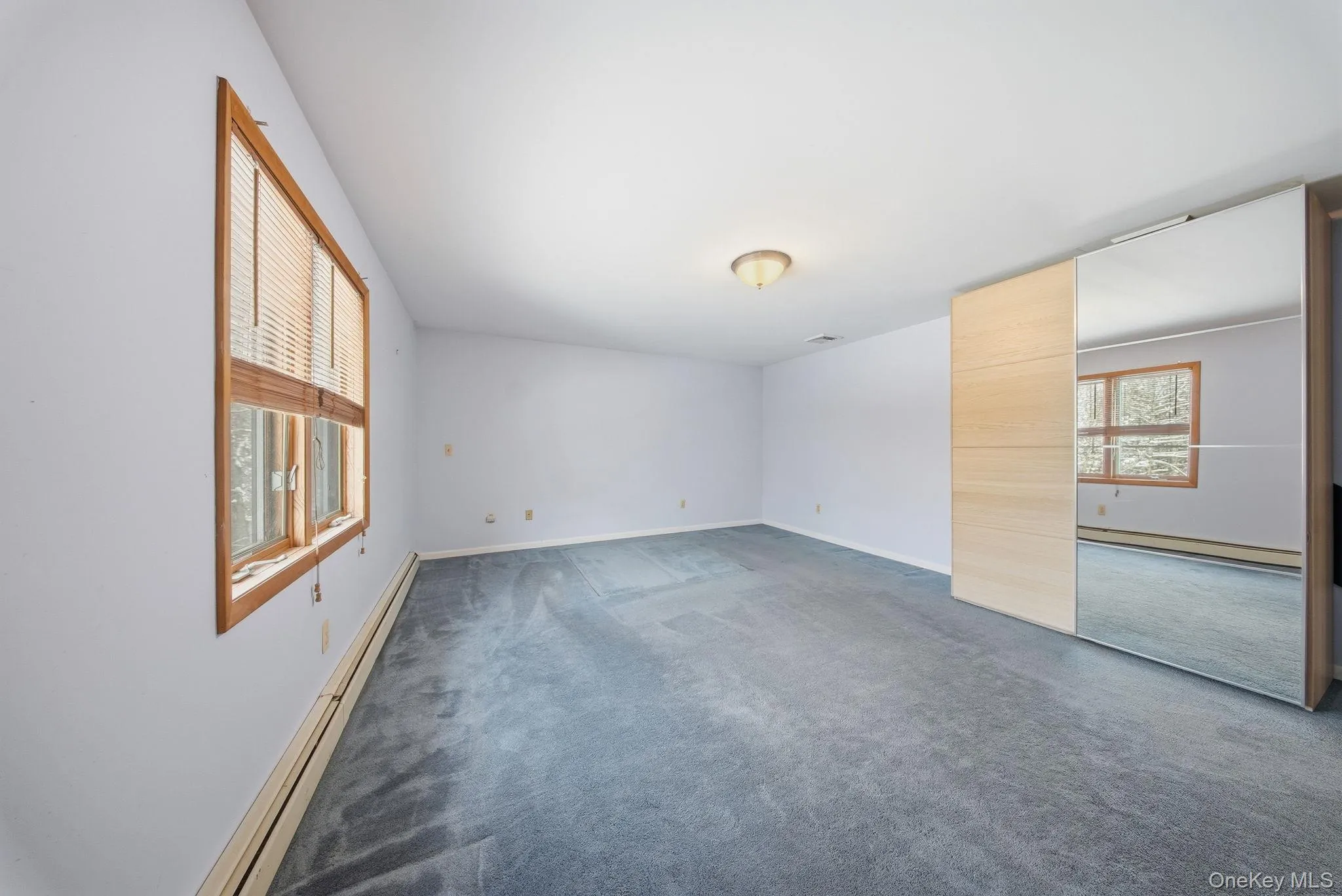 Large bright primary bedroom Large bright primary bedroom