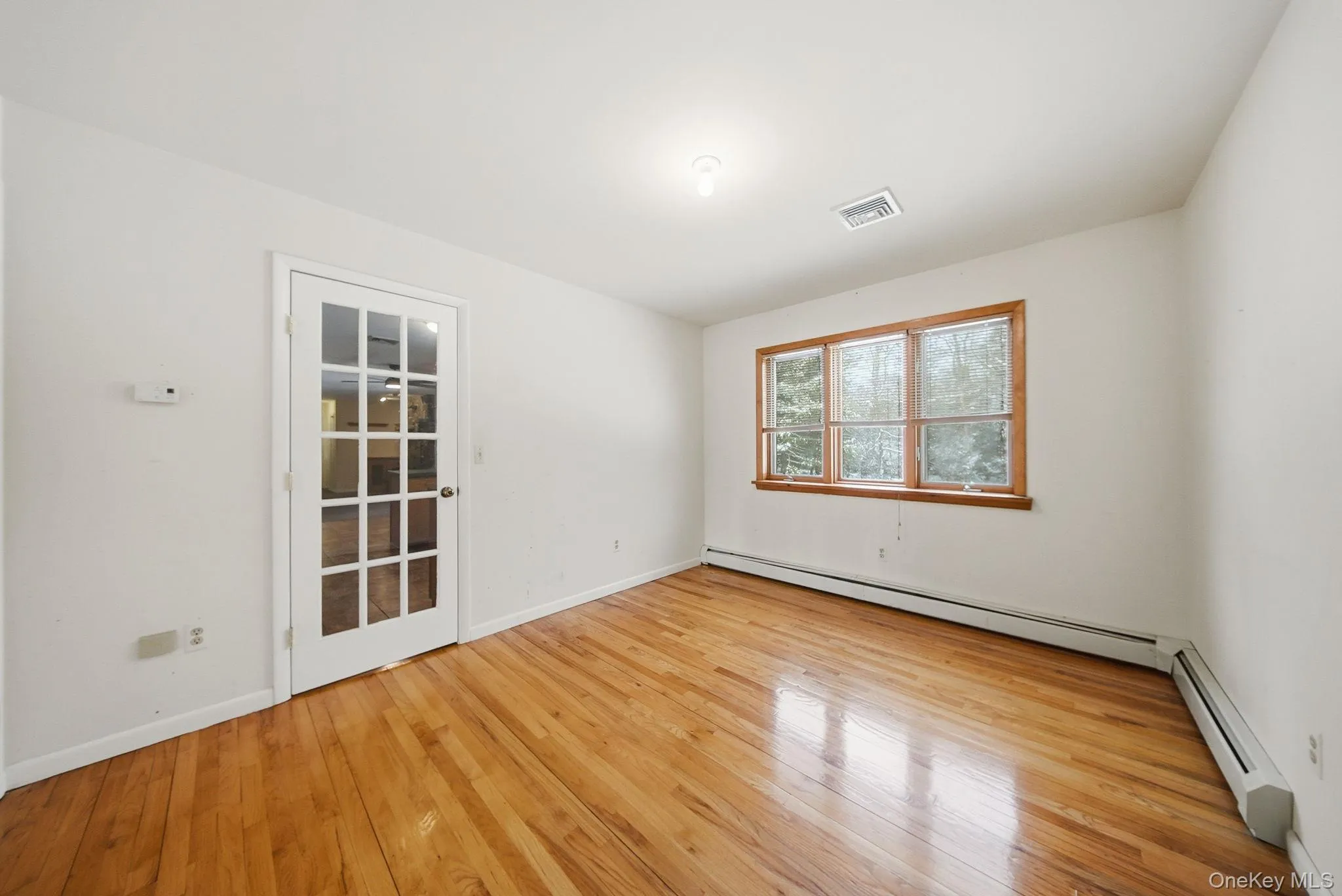 Large dining room off of kitchen and leading into living room Large dining room off of kitchen and leading into living room