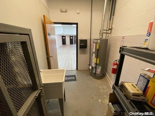 Utilities featuring water heater Utilities featuring water heater