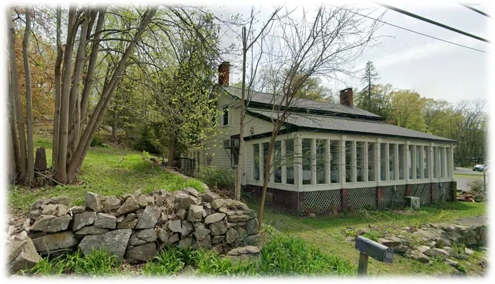 View of side of property with a chimney View of side of property with a chimney