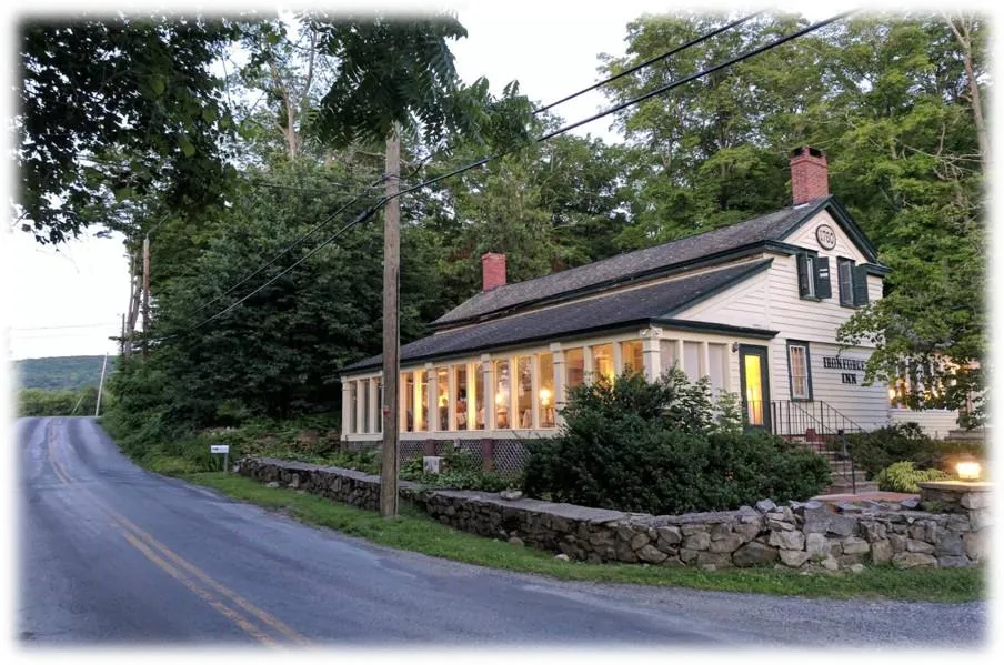 View of property exterior with a chimney View of property exterior with a chimney