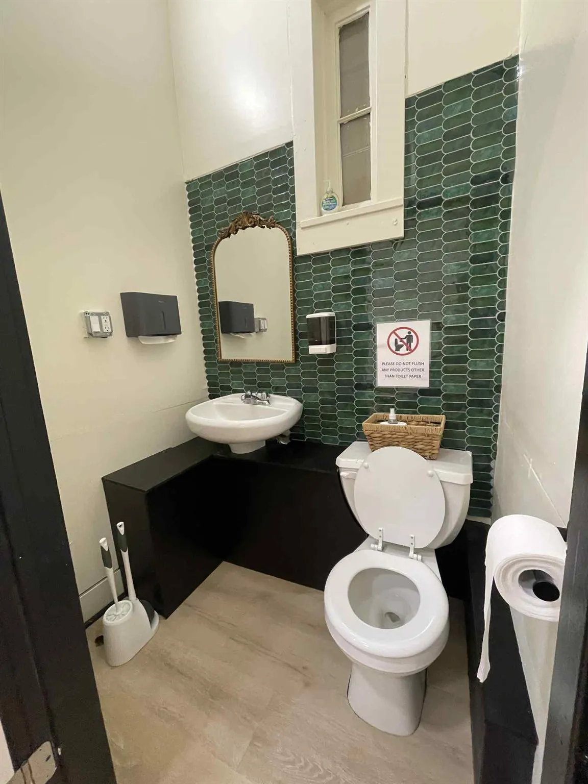 Bathroom with toilet and tile walls Bathroom with toilet and tile walls