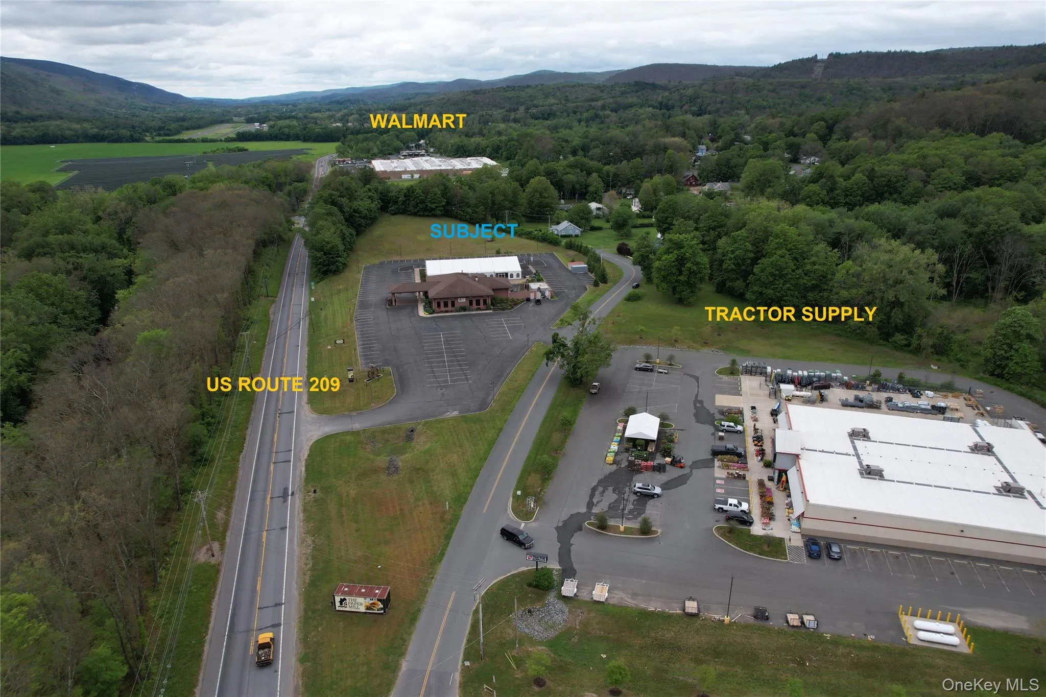 View of property location featuring a mountainous background and a heavily wooded area View of property location featuring a mountainous background and a heavily wooded area