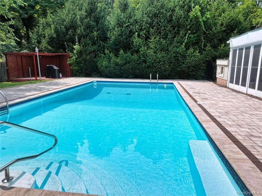 View of swimming pool,w/Pool House ( 1/2 bath, kitchenette, sitting/lounging room View of swimming pool,w/Pool House ( 1/2 bath, kitchenette, sitting/lounging room