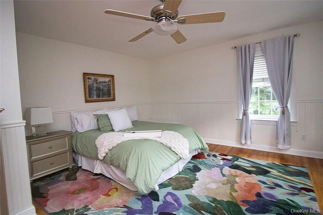 Very spacious bedroom with big picture window overlooking gorgeous resort-style backyard, wood-style flooring and ceiling fan with light fixture operated by remote. Very spacious bedroom with big picture window overlooking gorgeous resort-style backyard, wood-style flooring and ceiling fan with light fixture operated by remote.