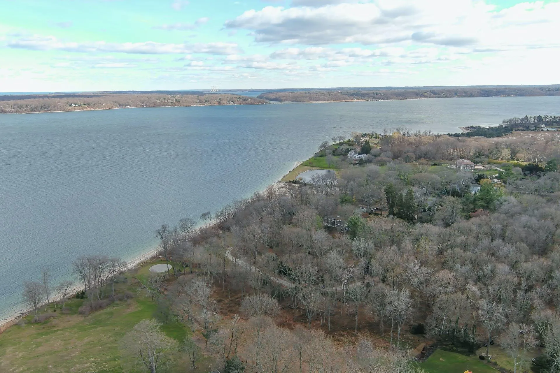 Aerial view of property's location featuring a nearby body of water Aerial view of property's location featuring a nearby body of water