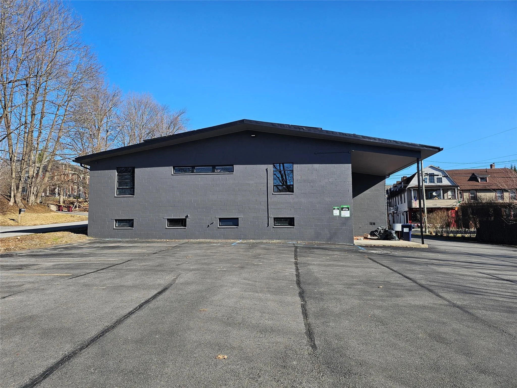 View of side of home with concrete block siding View of side of home with concrete block siding