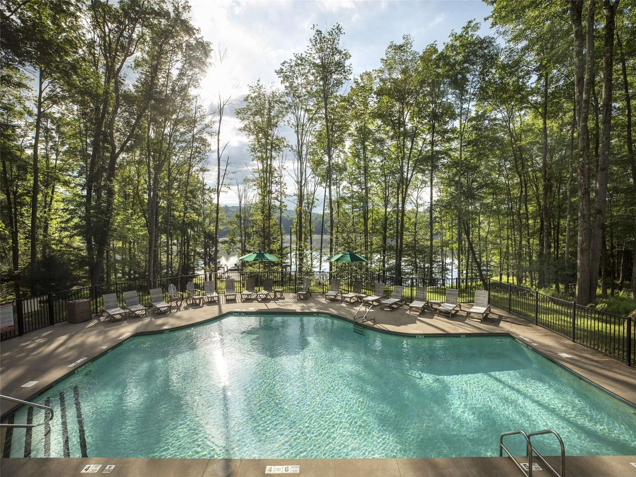 Community pool with a patio Community pool with a patio