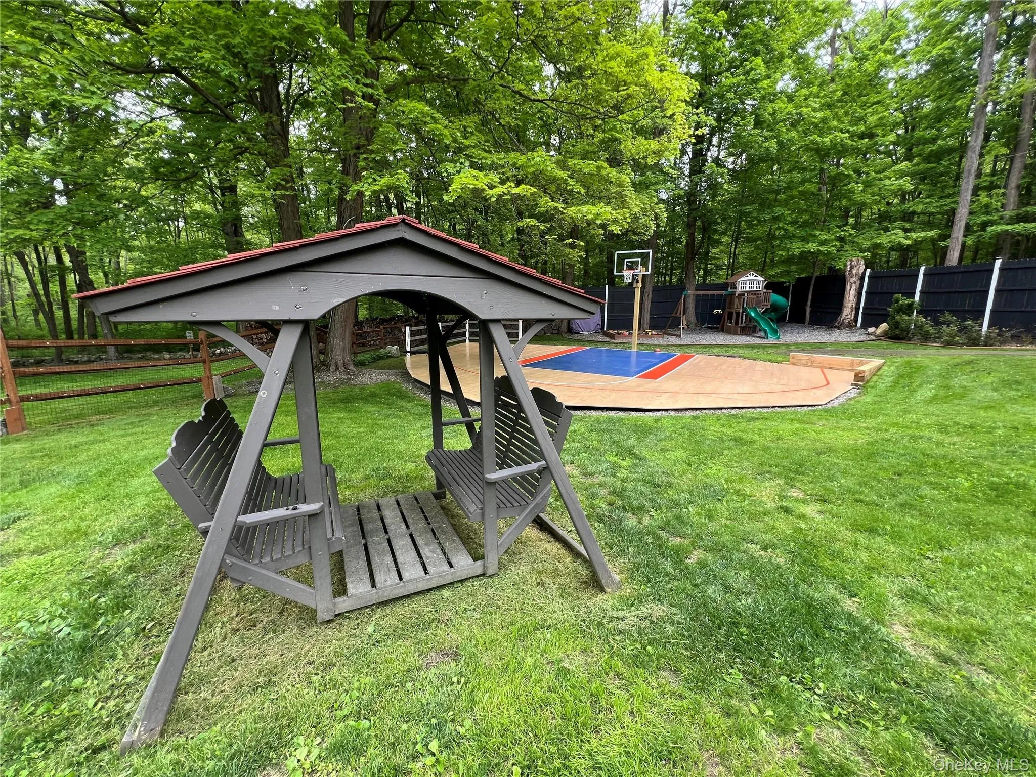 View of yard featuring a playground View of yard featuring a playground