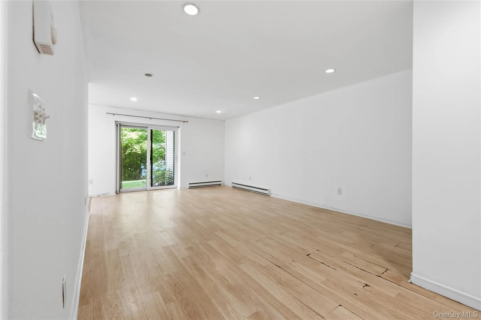 Living room with slider access to outside Living room with slider access to outside