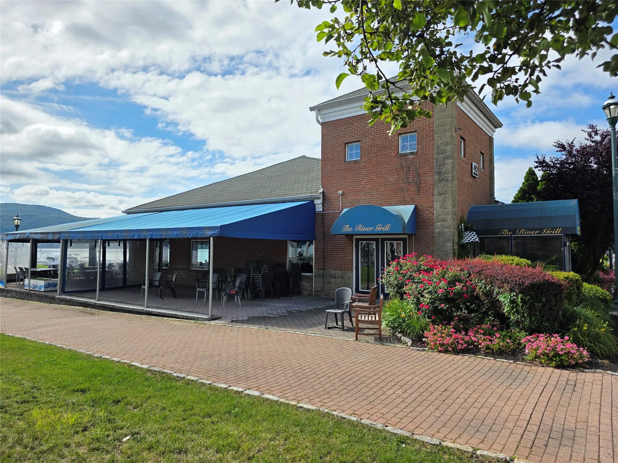 Back of property with brick siding Back of property with brick siding
